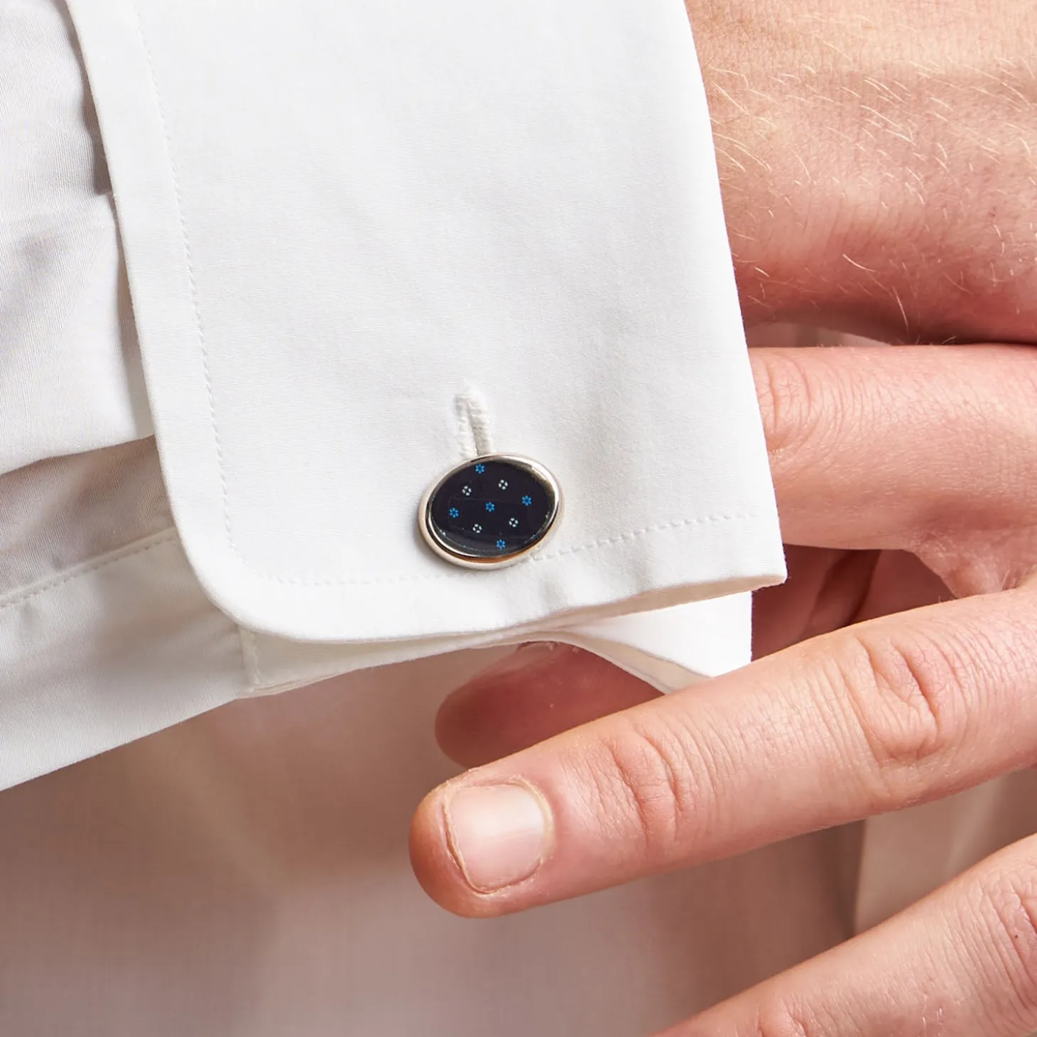 GEMELLI DA POLSO IN ARGENTO BLU Con microfantasia fiore