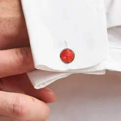 GEMELLI DA POLSO TONDO CON CORALLO In argento