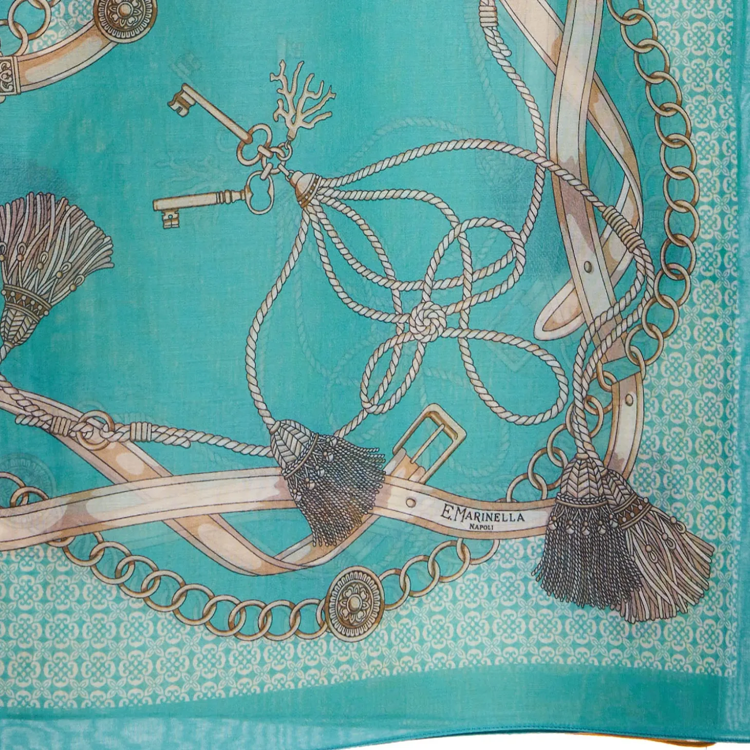 STOLA IN VOILE DI COTONE E SETA VERDE Microfantasia e nappine